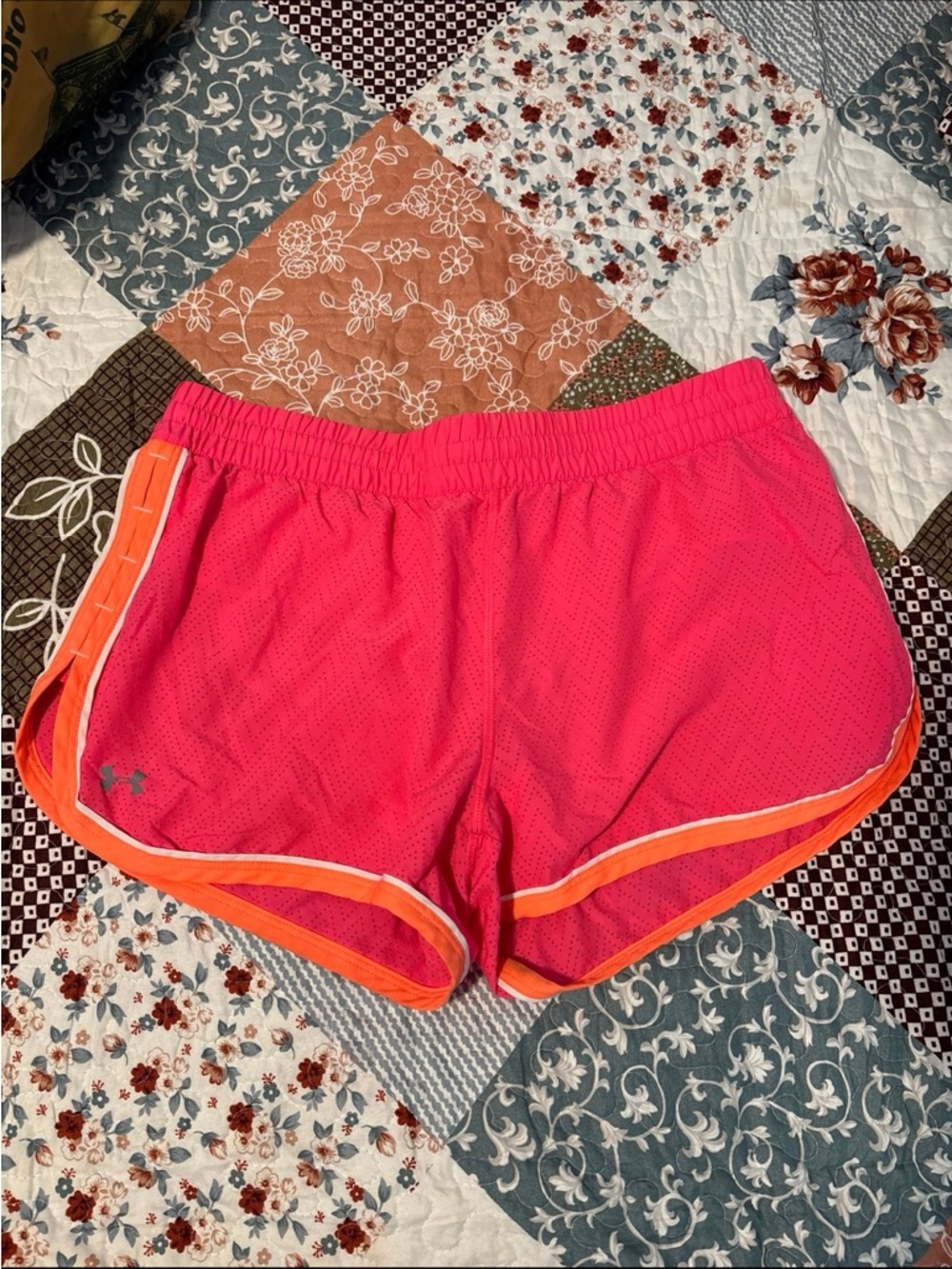 Under Armour Women’s Hot Pink Athletic Shorts with Orange Trim